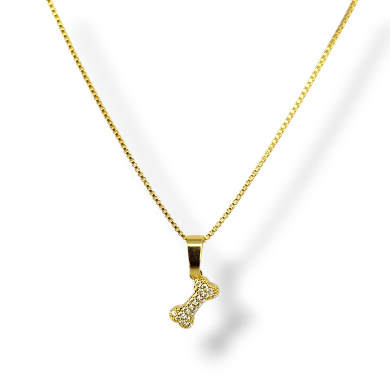 Colar Pingente De Osso Cravejado No Banho de Ouro