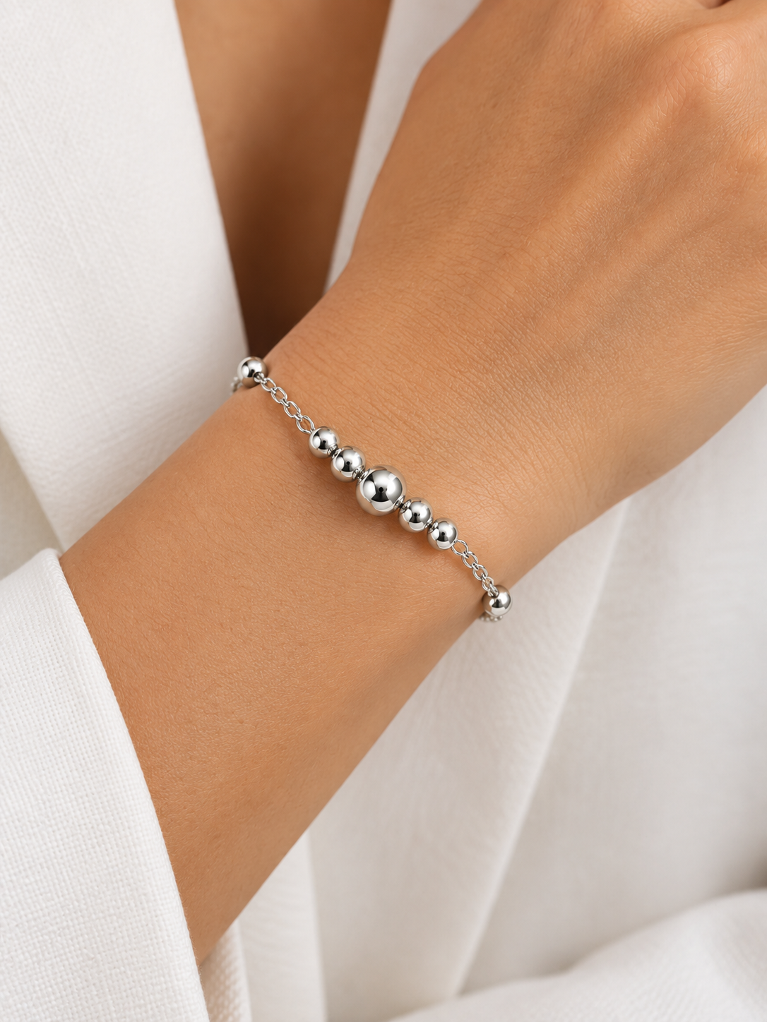 Pulseira de bolinhas (5 no meio variadas) em Prata 925